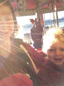 Me and the kiddos riding a neighborhood carousel at dusk...instead of staying at home to cook dinner